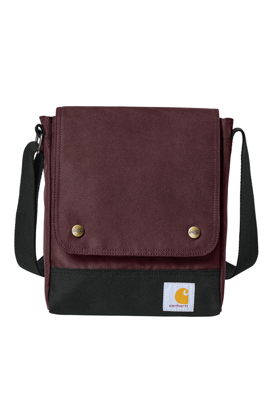 Black Carhartt® Crossbody Snap Bag with adjustable strap and front snap pockets, showing its compact and functional design.