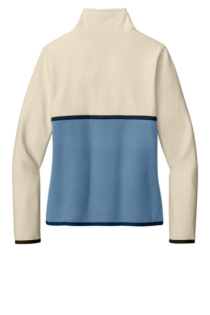 Cream-colored Cotopaxi Women’s Amado 1/2-Zip fleece jacket with a flat back and Fjord design, featuring a half-zip front.