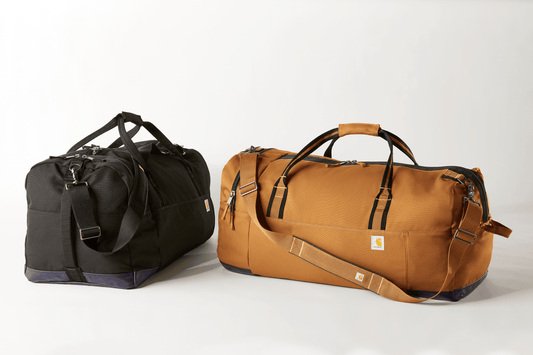 Carhartt 120L Foundry Series duffel bag with printed design, durable fabric, and sturdy handles for travel and storage.