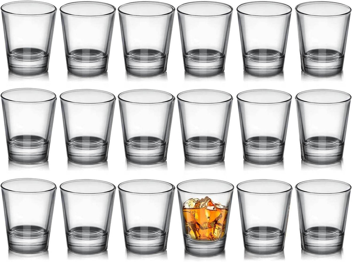 Set of 18 clear shot glasses by Print View, showcasing transparent glassware suitable for drinking or customization.