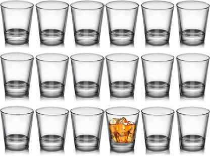 Set of 18 clear shot glasses by Print View, showcasing transparent glassware suitable for drinking or customization.