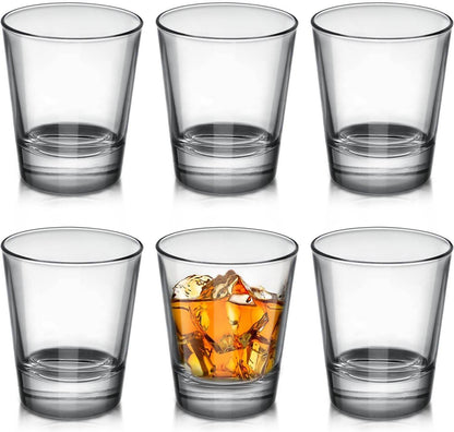 Six clear shot glasses by Print View, plain or customizable, made of glassware perfect for beverages and events.