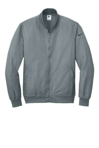 Nike lightweight bomber jacket in cool grey, shown from the front with customizable print options.