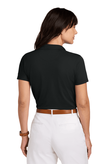 Black Brooks Brothers women's mesh pique performance polo shirt with breathable fabric and custom embroidery, shown on a female model.