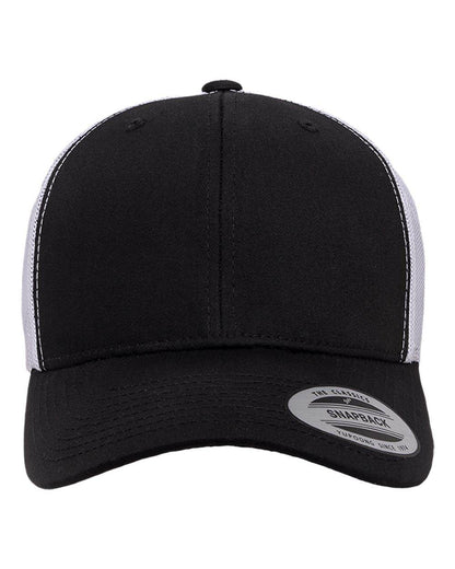 Black and white custom YP Classics retro trucker cap with embroidered logo, showcasing personalized design and breathable mesh panels.