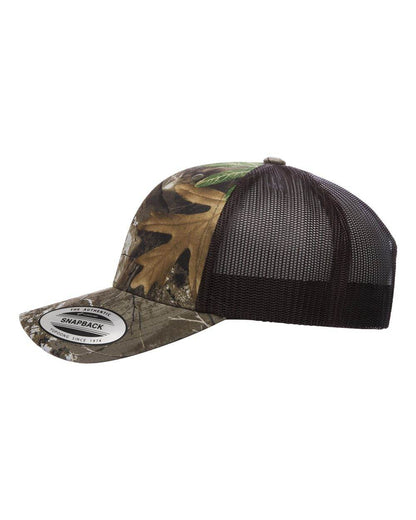 Brown Yupoong YP Classics® retro trucker cap with custom embroidered logo, featuring a classic trucker hat design and adjustable strap.