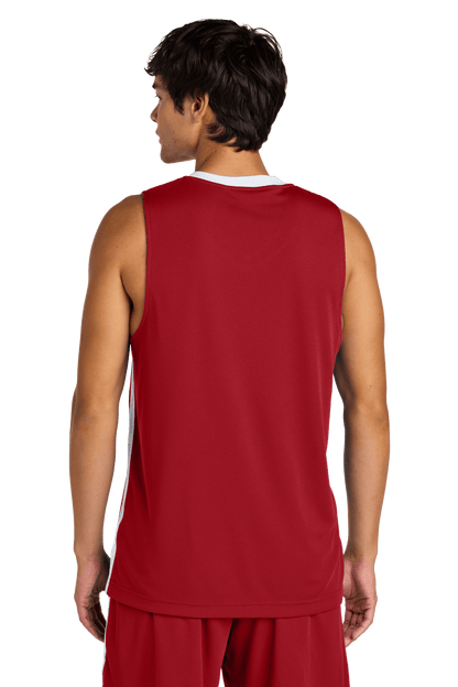 Red and white customizable Sport-Tek mesh basketball jersey with team name and number, lightweight and breathable.