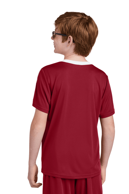 Red and white custom youth soccer jersey with Sport-Tek logo, featuring space for name, number, and team logo on the back.