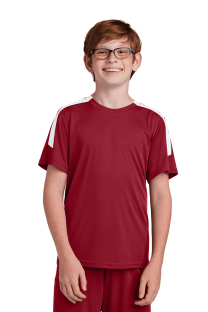 Red and white custom youth soccer jersey by Sport-Tek with team logo, name, and number printed on the front.