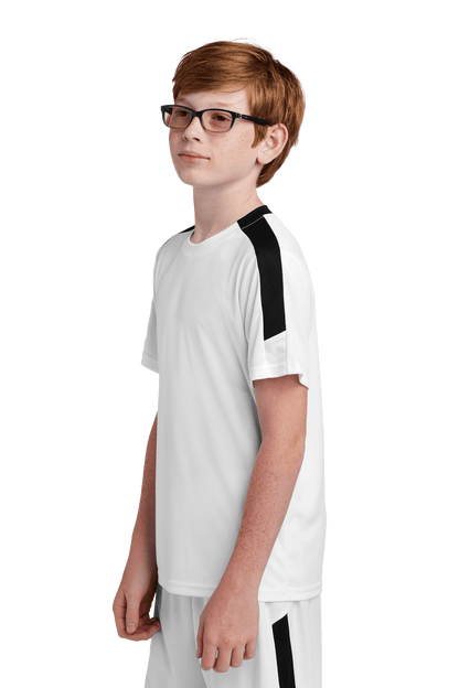 White and black custom youth soccer jersey by Sport-Tek with team logo, name, and number print, shown from the side view.
