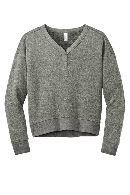 Heathered charcoal District® women’s Perfect Tri® fleece V-neck sweatshirt laid flat, showing soft fabric and classic V-neck design.
