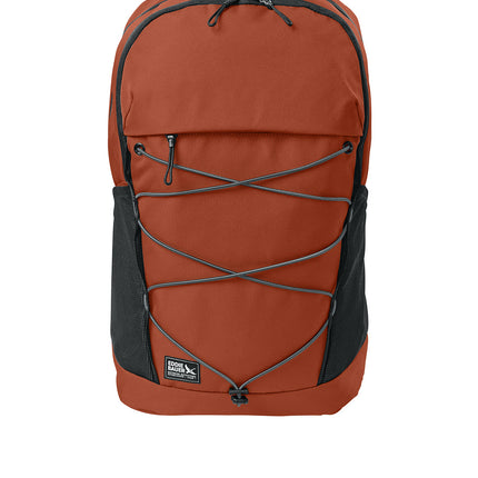 Eddie Bauer Adventurer Backpack in amber orange with front pocket and adjustable straps, designed for outdoor use.