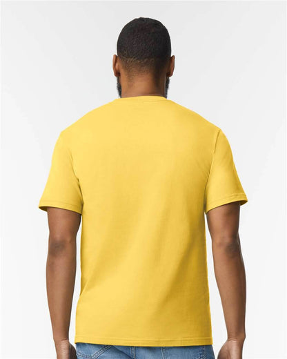 Gildan Softstyle midweight T-shirt in daisy pattern, back view on high-model, soft fashion style, printed fabric details visible.