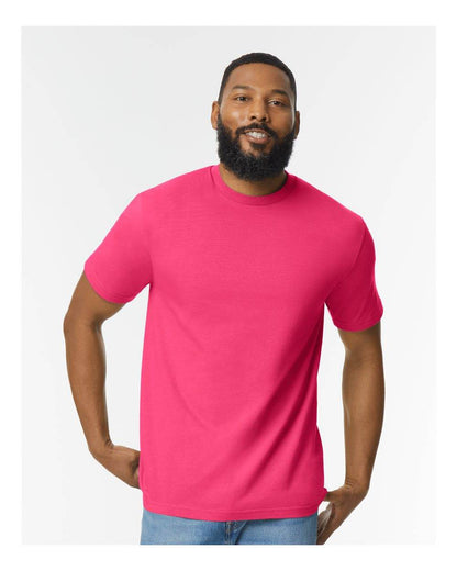 Gildan Softstyle midweight T-shirt in heliconia color, front view on a high-model, soft fashion style.