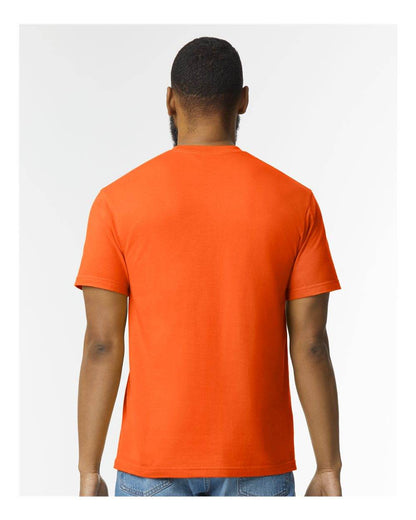 Gildan Softstyle® midweight T-shirt in orange, back view on high model, showcasing soft fabric and relaxed fit.