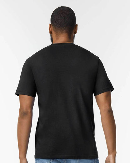 Black Gildan Softstyle midweight T-shirt on a high-model background, showcasing soft fabric and classic fit.