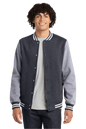 Graphite Heather varsity jacket by Sport-Tek with contrasting sleeves, front pockets, and ribbed cuffs, shown in print view.
