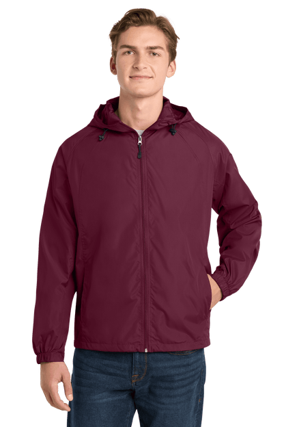 Maroon Sport-Tek Hooded Raglan Windbreaker jacket front view, lightweight and sporty with a hood and raglan sleeves.