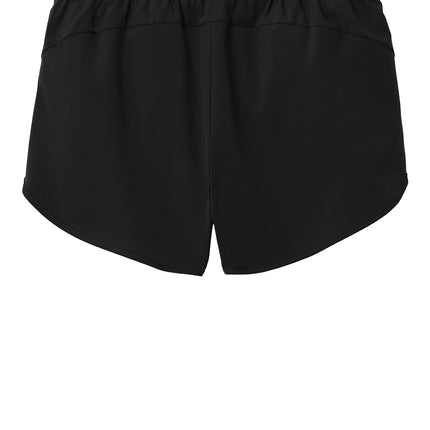 Sport-Tek Women’s Repeat Swift Short back view — black; streamlined fit with rear mesh detail and venting (custom options).