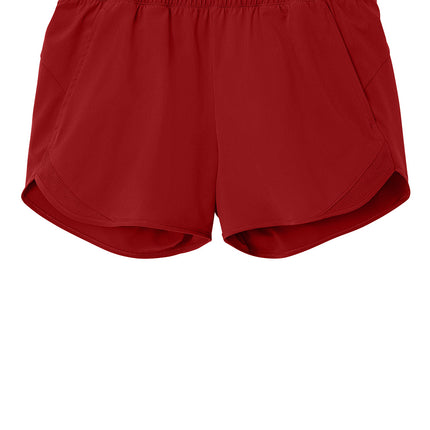 Sport-Tek Women’s Repeat Swift Short front view — red; lightweight 3.5oz snag-resistant short with drawcord, side pockets, inner liner (Personalized option).