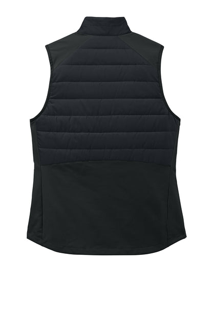 Black Sport-Tek® Women’s Teknical Hybrid vest with lightweight, breathable fabric and a sleek flat-back design.