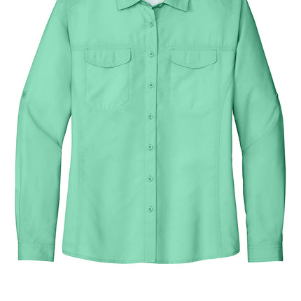 Bright seafoam green Port Authority women's long sleeve UV Daybreak shirt with front view, lightweight and sun-protective.