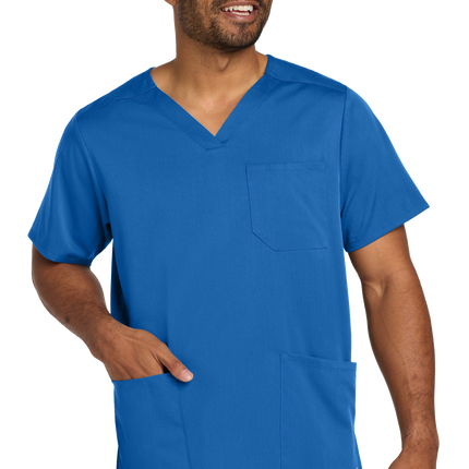 Male nurse wearing Blue flex V-neck scrub top front