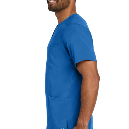 Male nurse wearing Blue flex V-neck scrub top side