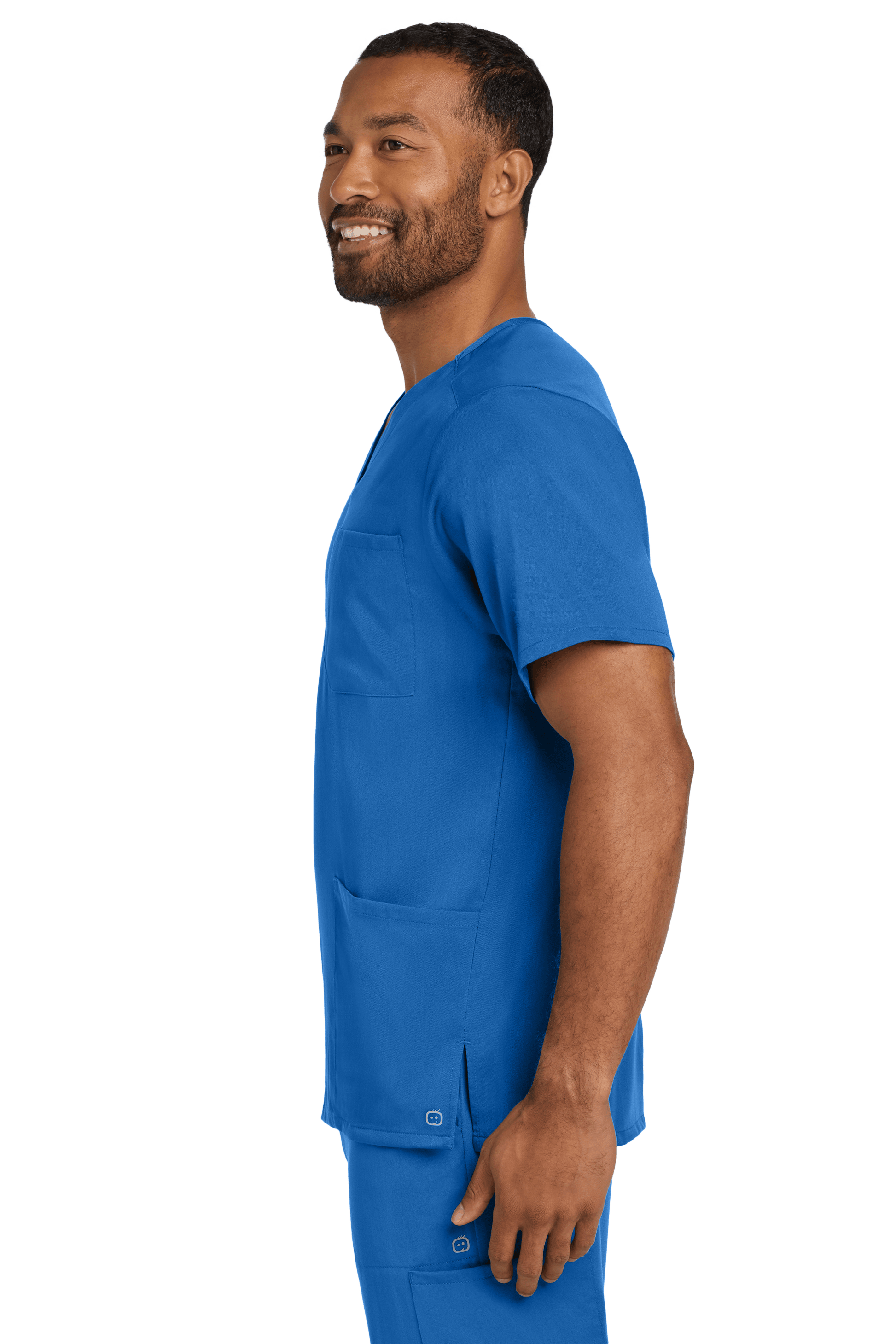 Male nurse wearing Wink blue Men's Premiere Flex V-Neck scrub top, showing the front view of the print design.
