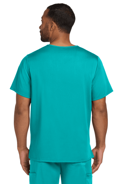 Male nurse wearing Wink Men's Premiere Flex V-Neck Scrub Top in teal, showing the back view with a printed design.