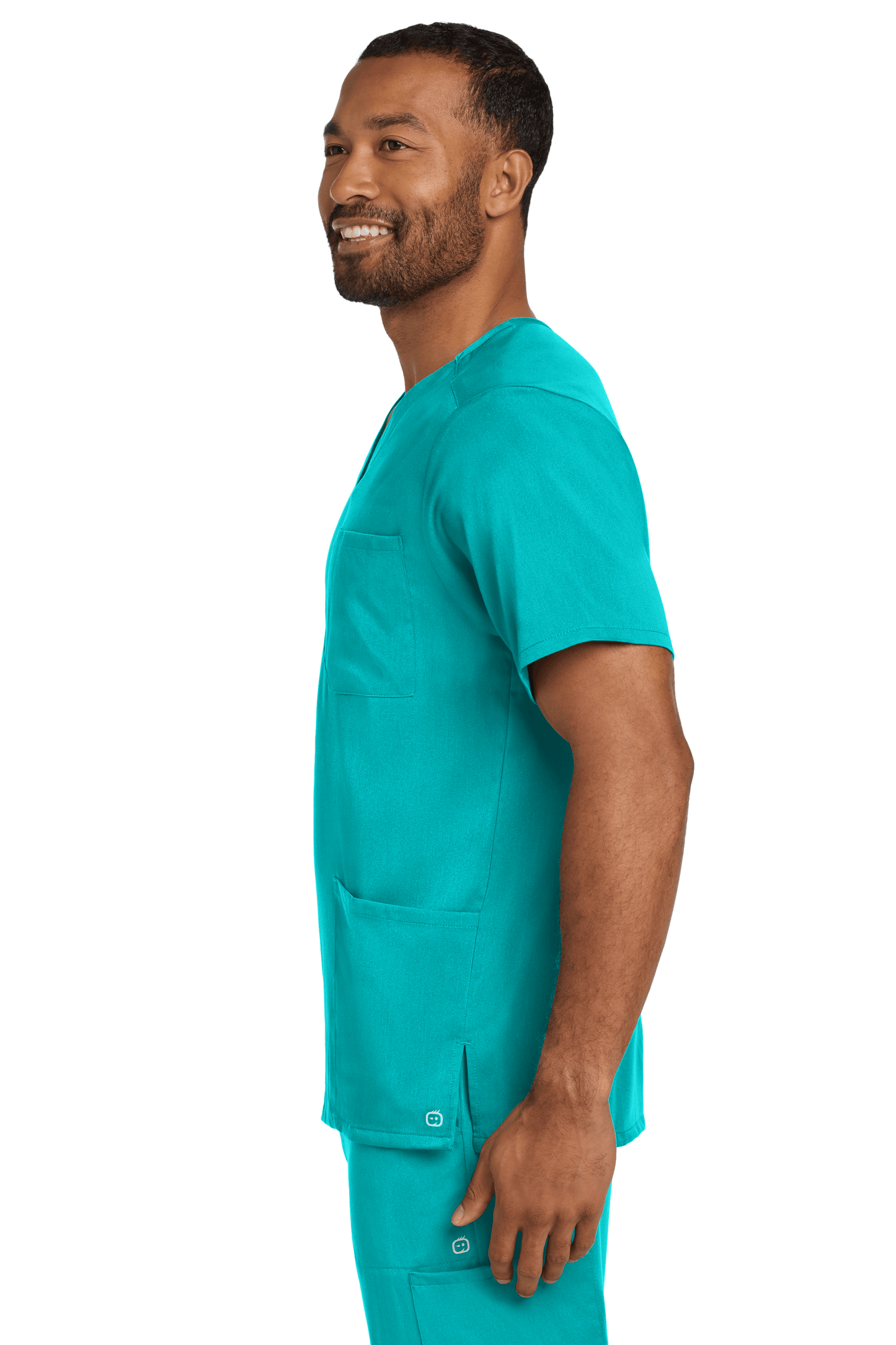 Male nurse wearing teal Wink Premiere Flex™ V-Neck scrub top with print, front view showing comfortable fit and professional style.