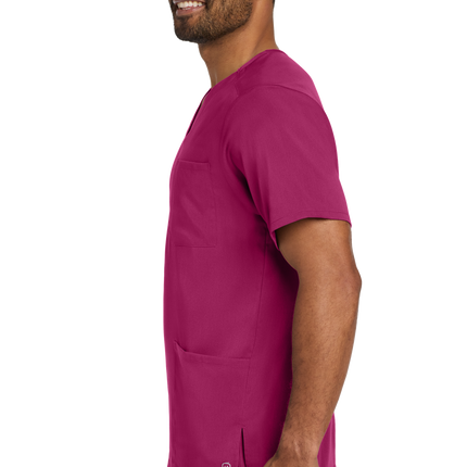 Male nurse wearing Wine flex V-neck scrub top side