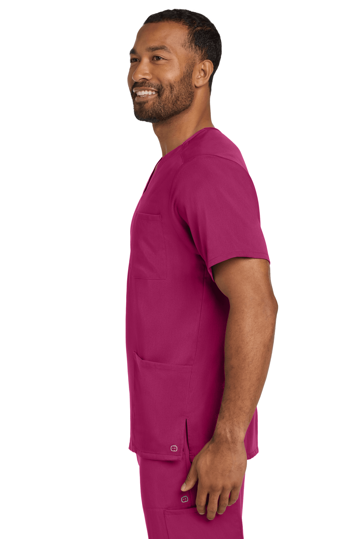 Male nurse wearing Wink Men's Premiere Flex V-Neck Scrub Top in wine color, showing side view of the printed design.