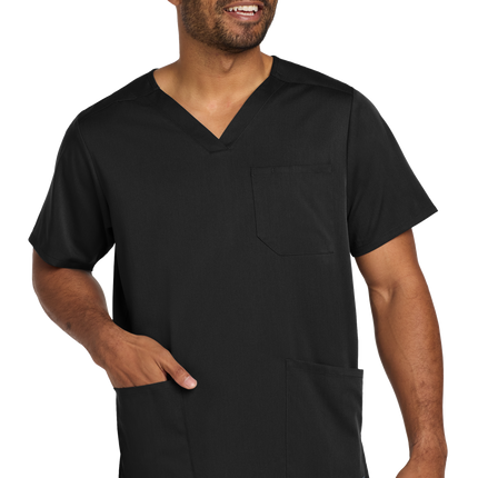 Male nurse wearing black flex V-neck scrub top front