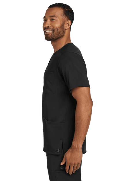 Male nurse wearing Wink Men's Premiere Flex V-Neck Scrub Top in black, shown from the side with a comfortable fit.