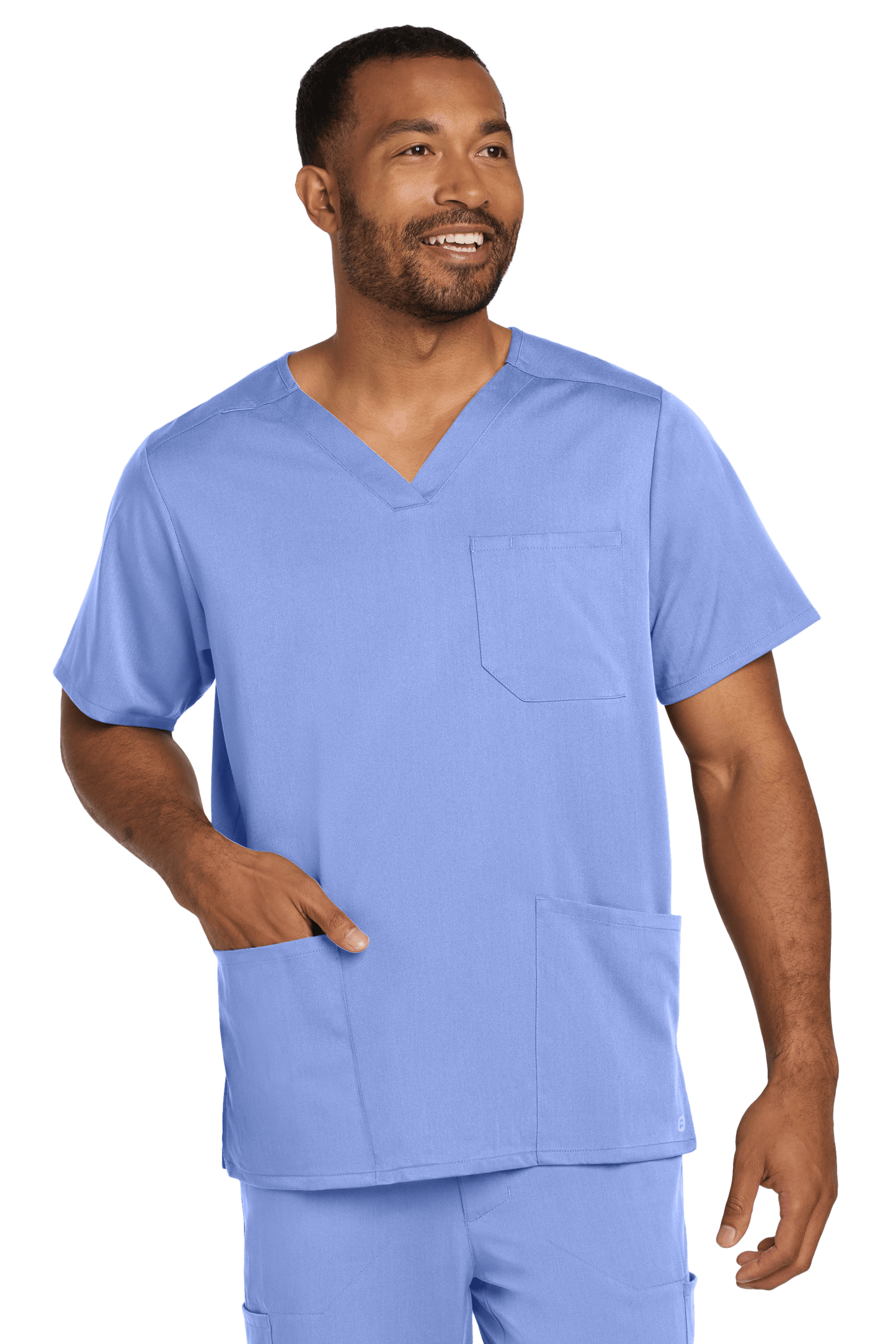 Male nurse wearing Wink Men's Premiere Flex V-Neck Scrub Top in light blue, front view showing the printed design.