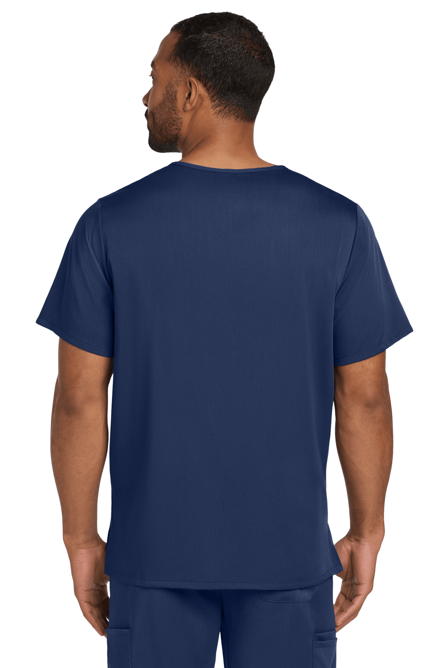Navy blue Men's Premiere Flex V-Neck Scrub Top by Wink worn by male nurse, showing back view with printed design.