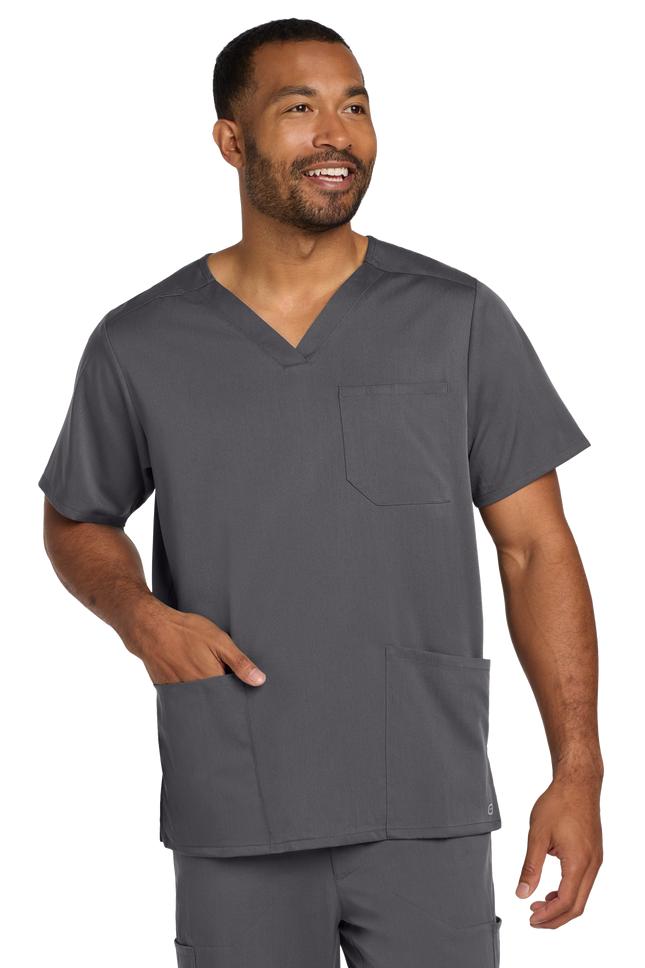 Male nurse wearing pewter grey flex V-neck scrub top front