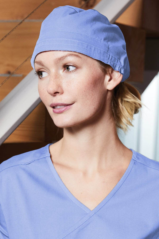 Light blue Wink Medical Workwear Flex Scrub Cap with printed design, showing a comfortable, adjustable medical scrub cap.
