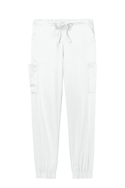 White women's Wink Premiere Flex jogger pant, nursing scrubs with printed design, comfortable medical workwear for women.