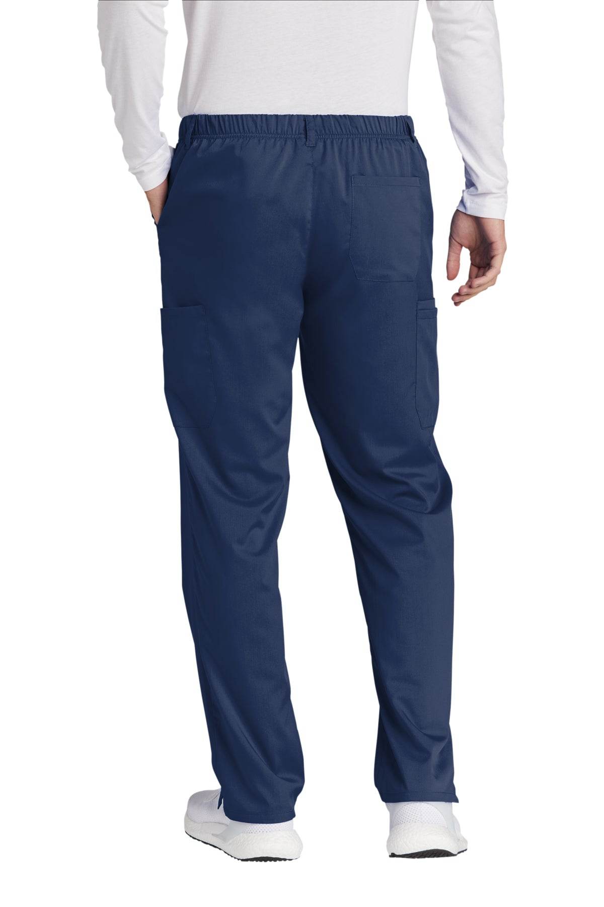 Navy blue men's Premiere Flex cargo scrubs by Wink with functional pockets, shown from the back view.