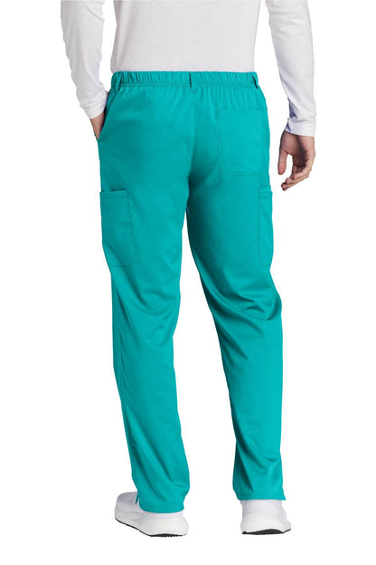 Men's Wink Premiere Flex Cargo Scrubs in teal, showing back view with multiple pockets and flexible fabric for medical workwear.