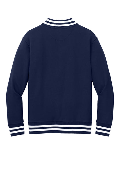 New Era varsity heavyweight fleece jacket in true navy with flat back design, featuring classic varsity style and warm fleece material.