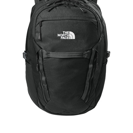 The North Face® 31L Royal Arch Backpack in black with front zip pocket and adjustable straps, designed for outdoor and daily use.