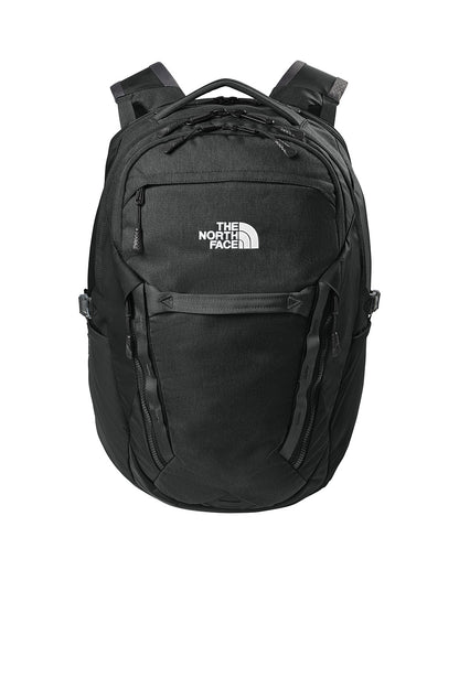 The North Face 31L Royal Arch Backpack in black with front zip pockets and padded shoulder straps, designed for outdoor use.