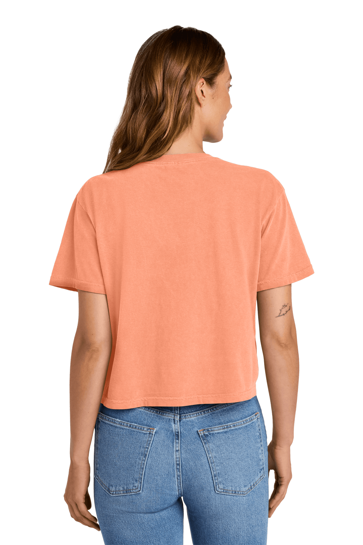 Comfort Colors women's heavyweight crop top in neon cantaloupe mint with a relaxed fit and garment-dyed finish, shown on a model.