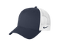Nike navy and white mesh trucker cap with printed design, featuring adjustable snapback closure and classic style.