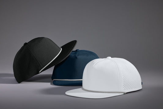 OGIO® 5-Panel Rope Performance Cap with adjustable strap, black fabric, and OGIO branding on front for athletic and casual wear.