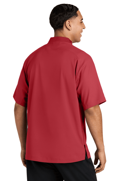 Red New Era cage short sleeve quarter zip jacket with custom printed design, shown from the back.