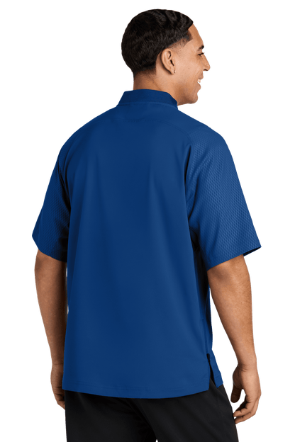 Royal blue New Era® cage short sleeve quarter zip jacket with custom print, shown from the back.